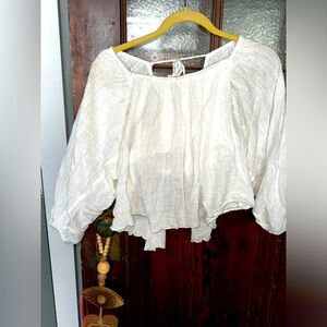 Reserved do not buy 
Free People white cotton gauze open back top with a tie